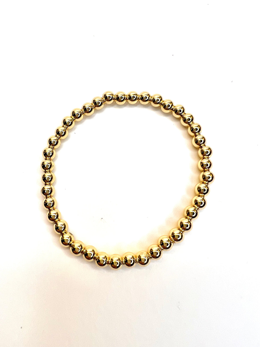 Statement-Making Gold Bead Bracelet